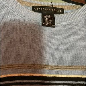 blue sweater w/ white, grey, black stripes